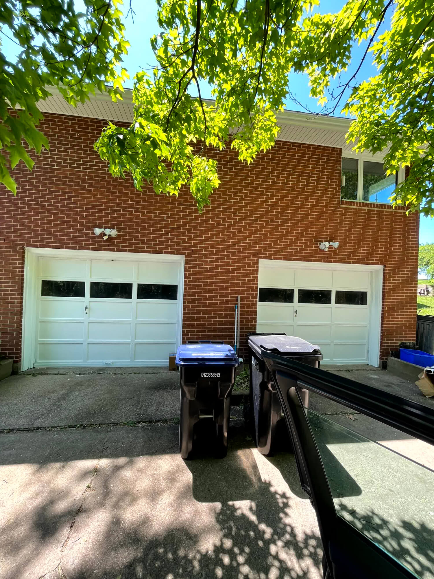 A beautiful natural wood deck overlooking a suburban valley and city skyline, demonstrating skilled Deck Construction in Beaver County, PA .